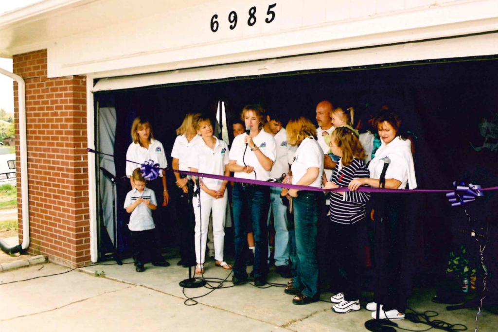 Hope House founder, Lisa Steven along with local supporters at 2003 ribbon cutting for new residential home for teen moms.